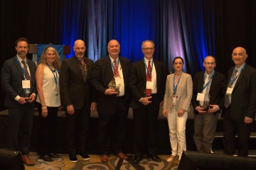 Photo of Dr. Jason Lowe and other award recipients